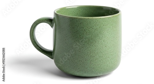 Green ceramic coffee mug with small dots