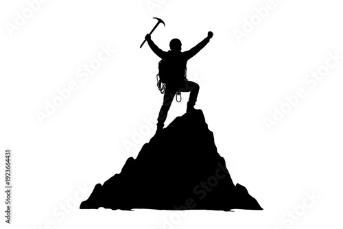 Silhouette of a triumphant male climber on mountain peak with ice axe.