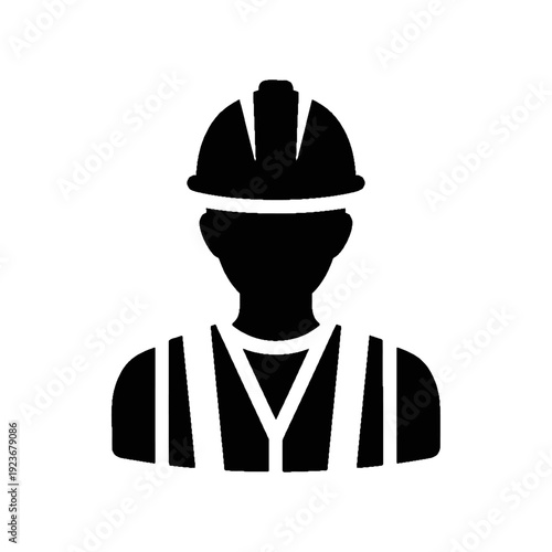 Firefighter in uniform with helmet standing ready for emergency response