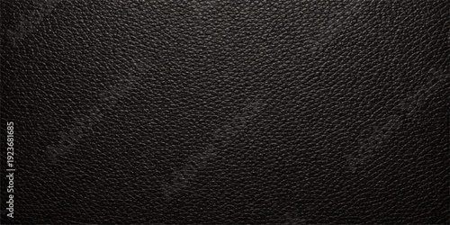 A macro closeup of a dark black leather texture background shows the natural animal skin pattern and rough material structure of the textile surface