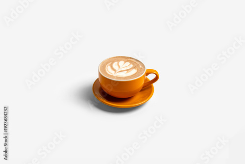 Latte art coffee in orange cup isolated on white background