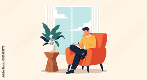 Calm man sitting in a comfortable armchair by a window and writing in a notebook, enjoying a quiet moment of creativity or reflection.