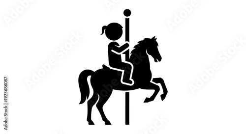 A girl rides a horse on a merry-go-round in an amusement park.