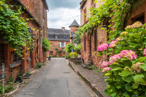 Red houses seen from the street in Collonges-la-Rouge - France