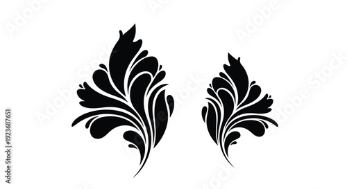 Elegant black floral swirls and flourishes on a white background