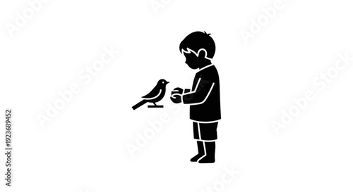 A boy feeds a bird from his hand in a gentle outdoor scene byo.