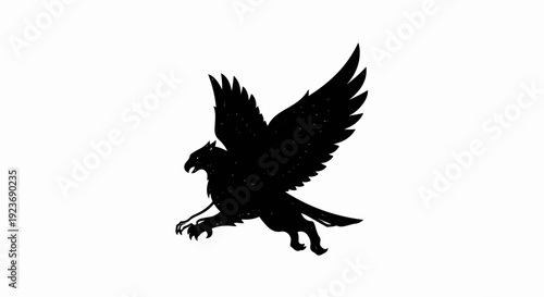 Silhouette of a mythical griffin in flight with wings spread wide