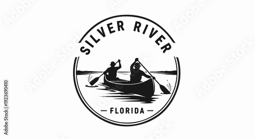 Silhouette of two people paddling a canoe on a river, within a circular emblem