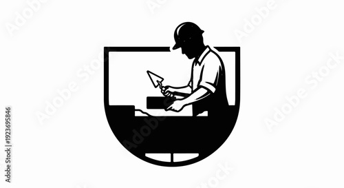 Silhouette of a bricklayer wearing a hard hat, using a trowel to lay bricks