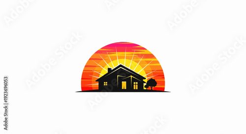 Silhouette of house with a radiant sunset behind it