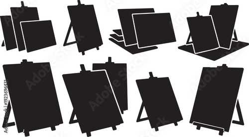 Collection of blackboards and easels in various positions displayed