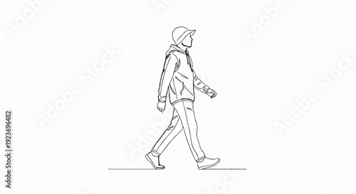 Person in casual clothing, wearing a cap, walking