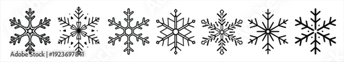 A series of intricate symmetrical black and white snowflake like designs in a horizontal arrangement