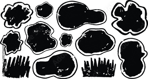 The image features hand-drawn black irregular shapes, each outlined in white, creating an interesting visual contrast. These shapes exhibit a grunge or marker style, characterized by their rough, 