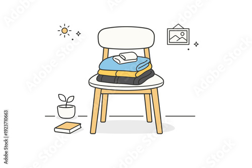 Clothing on chairs. A minimal interior scene with a chair holding folded clothes, placed neatly yet casually. The mood conveys everyday routine and quiet