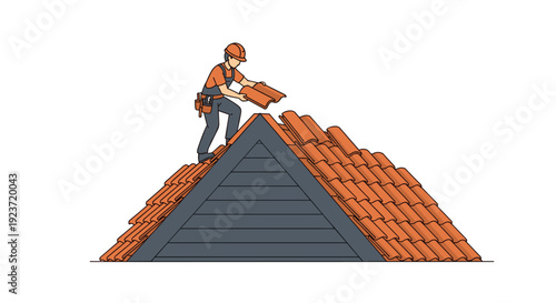 A construction worker in a hard hat installs red roof tiles on the peak of a gable roof structure.