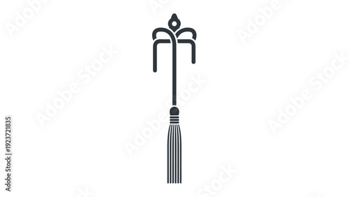 Decorative tassel with metal holder.