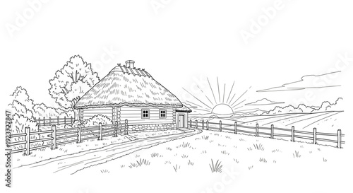 Charming country house in rural landscape with sunlit fields and pathway