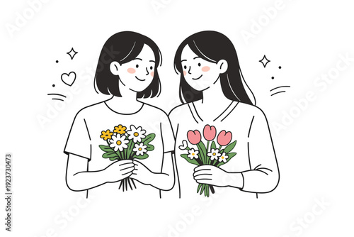 Women smiling naturally with flowers together. Two women stand close with flowers in their hands, sharing a quiet smile without posing. The