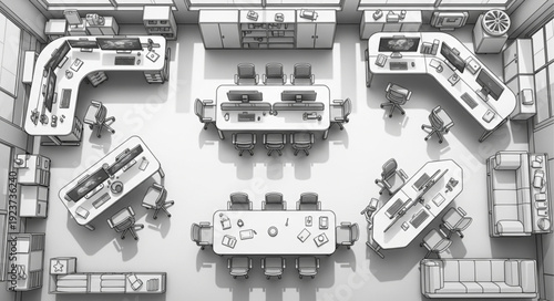 Overhead view of a modern office space with workstations and meeting tables.