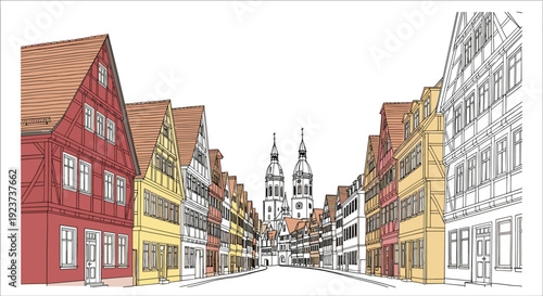 Charming medieval street with colorful half-timbered houses and historic church towers