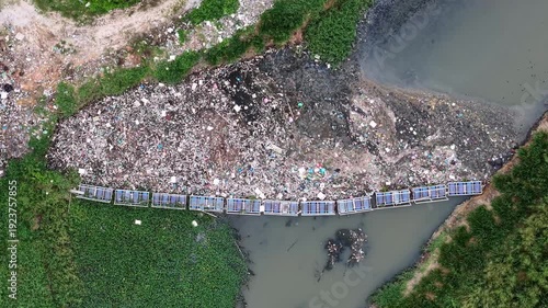 Aerial drone view of river rubbish trapment and barrier