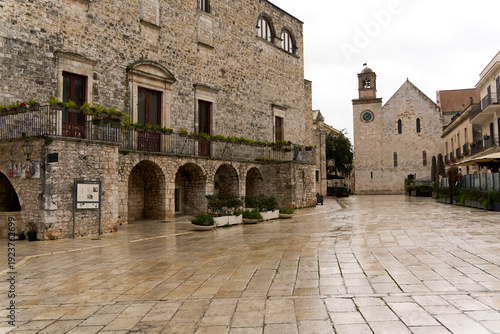Putignano main square with historic palazzo and church