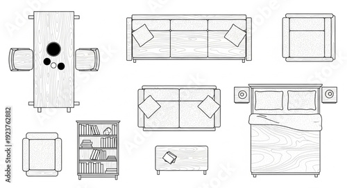 Detailed top-down view of various furniture pieces, including sofas and a bed, in a room layout.