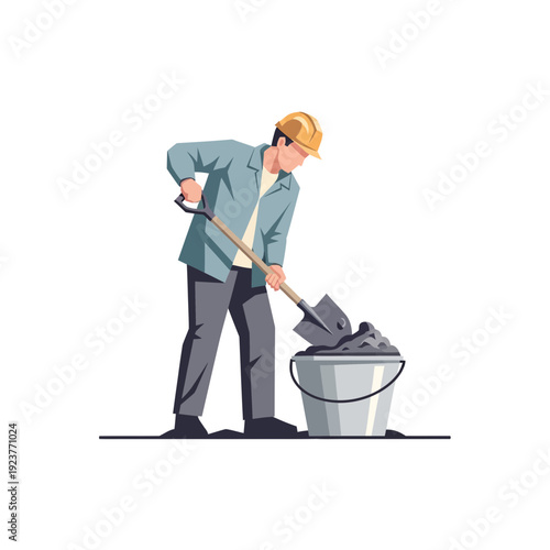 Construction worker shoveling material into bucket