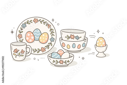 Easter Ceramics Collection. Hand-painted Easter ceramic tableware. A small editorial arrangement of plates, bowls, and mugs with delicate floral and egg