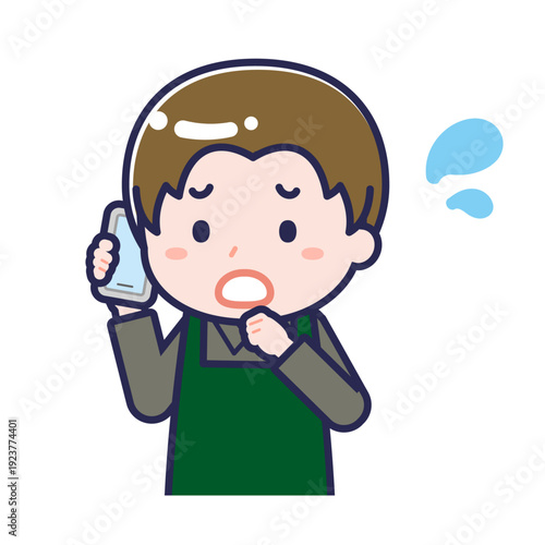 スマートフォンを使う「飲食店の店員」の男性