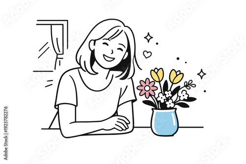 Women smiling naturally with flowers indoors. A woman stands near a window or table with flowers, smiling casually as light falls on her face. The mood is