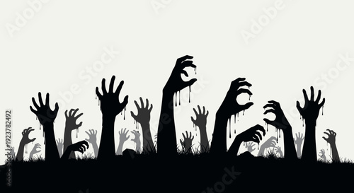 Silhouette of many zombie hands reaching out from the ground in a creepy scene.