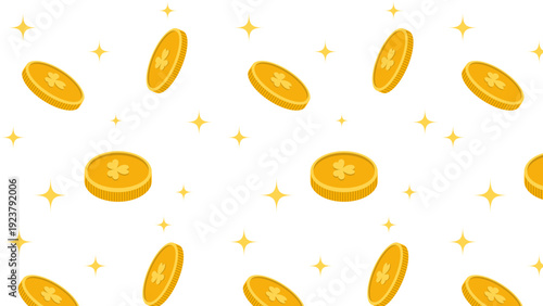 Golden coins and stars scattered randomly across a plain surface, viewed from directly above, creating a festive pattern.