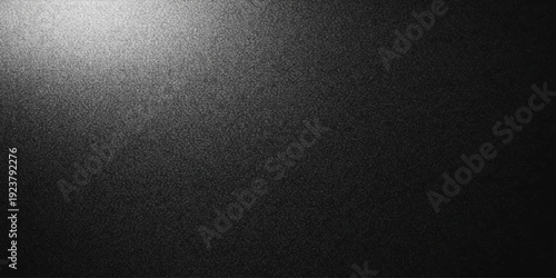 A dark macro closeup of a rough black leather texture background reveals a detailed material surface with a grunge pattern, perfect for a high-quality textile wallpaper or design backdrop
