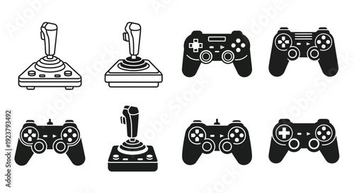 Variety of gaming controllers and joysticks in a black silhouette