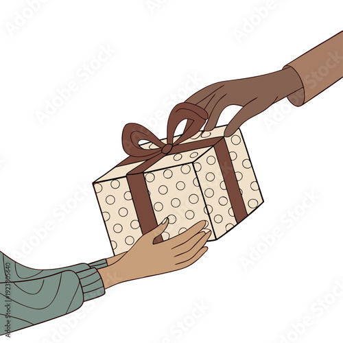 Person giving and receiving gift box with polka dots and brown ribbon