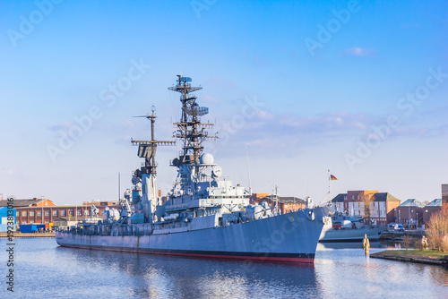 Fotografie Historic battleship in the Ems-Jade canal of Wilhelmshaven, Germany
