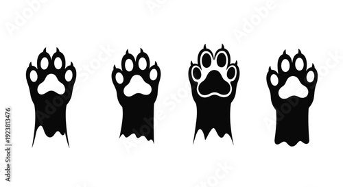 Four black paw prints displayed in a row stark silhouette