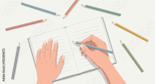 An overhead shot shows a hand writing in a lined notebook surrounded by scattered colored pencils on a clean, bright surface, perfect for education or creativity concepts.