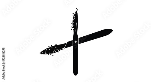 Black straight razor with shaving cream particles