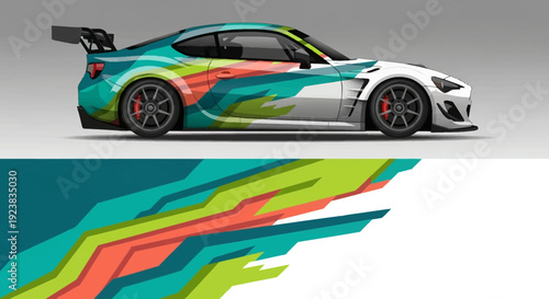Vibrant multi colored racing car wrap with dynamic geometric patterns on a sleek track-ready vehicle.