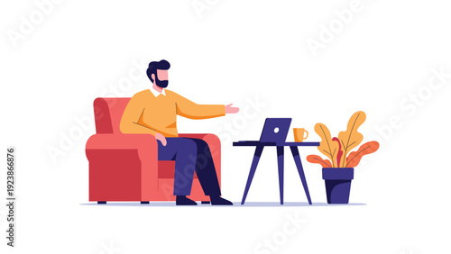 Professional man with beard sitting in a comfortable armchair and working on his laptop in a minimalist home office.