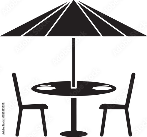 A black and white image of an outdoor table and chairs with an umbrella
