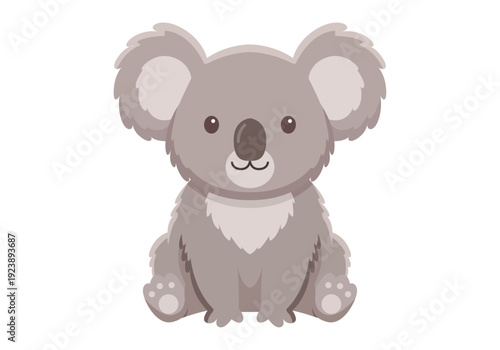 Pequeño koala gris con pelaje esponjoso sentado mirando hacia el frente