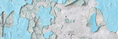 Peeling paint on the wall. Old concrete wall with cracked flaking paint. Weathered rough painted surface with patterns of cracks and peeling. High resolution texture for background and design. Closeup