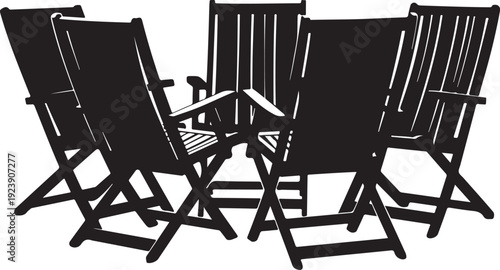 Group of black folding chairs arranged in a circle