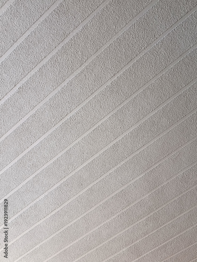 Fototapeta premium Wall background with diagonal stripes effect
