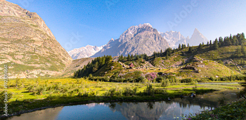 The Tour du Mont Blanc crosses France, Italy, and Switzerland, offering breathtaking views of glaciers, alpine passes, and the highest peak in the Alps.