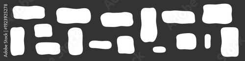 Abstract set of irregular white hand-drawn stone shapes on a dark background. Minimalist cobblestone or wall pattern elements for graphic design